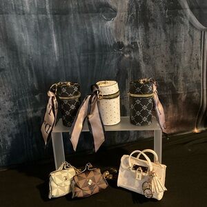 Mini keychain, cardholder, money, lipstick etc.  Bottom row